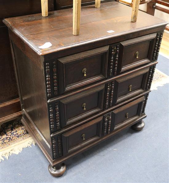 A small Jacobean style oak chest W.78cm